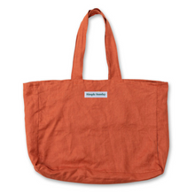 Load image into Gallery viewer, rust coloured extra large linen beach bag on white background
