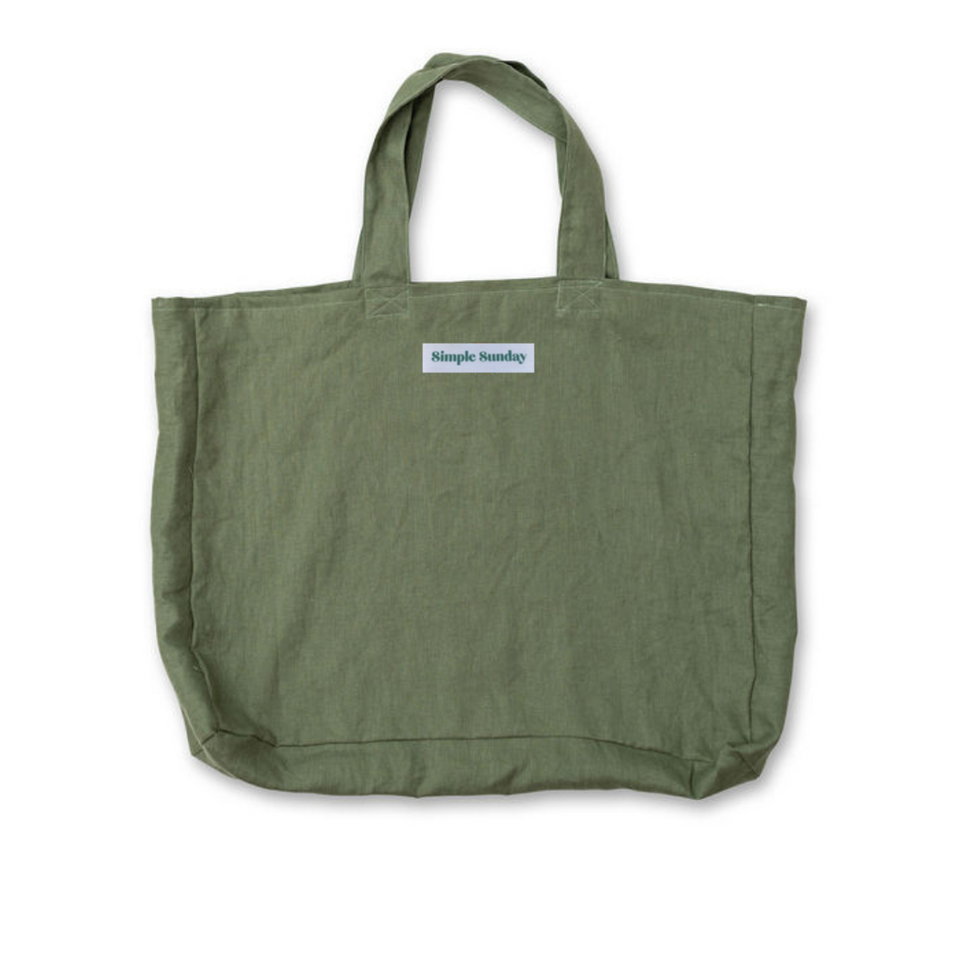 extra large olive coloured linen beach bag on white background